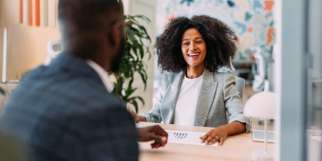 Brokers meeting with client