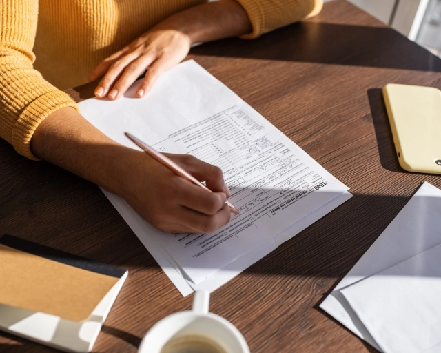 woman filling out form