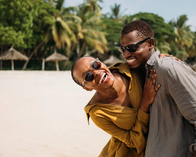 Smiling couple on beach