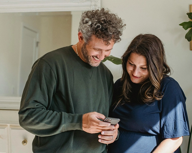 couple looking at phone