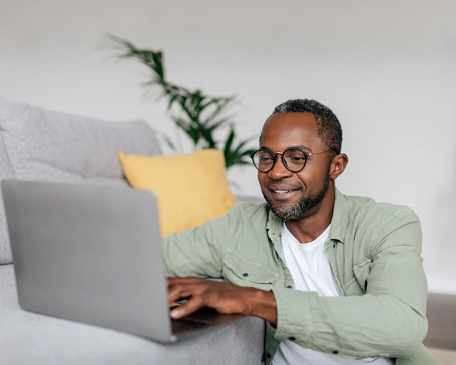 man talking to online counsellor